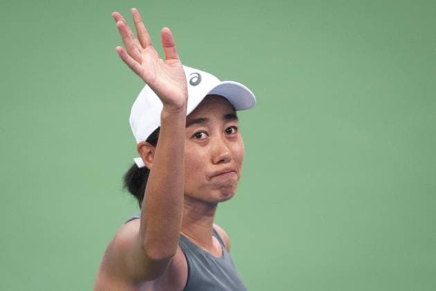 (251007) -- WUHAN, Oct. 7, 2025 -- Zhang Shuai of China waves to spectators after the women s singles round of 64 match against Emma Navarro of the United States at the 2025 Wuhan Open tennis tournament in Wuhan, central China s Hubei Province, Oct. 7, 2025. ) (SP)CHINA-WUHAN-TENNIS-WUHAN OPEN-WOMEN S SINGLES (CN) XiaoxYijiu 