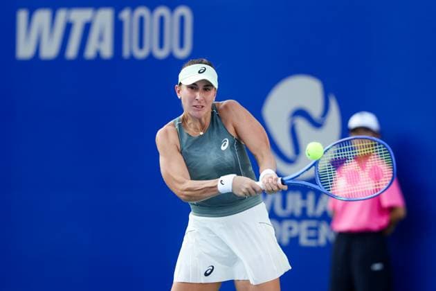 WUHAN, CHINA - OCTOBER 07: Belinda Bencic of Switzerland returns a shot in the Women s Singles Round of 64 match against Donna Vekic of Croatia on day 4 of 2025 Wuhan Open at Optics Valley International Tennis Center on October 7, 2025 in Wuhan, Hubei Province of China.  Copyright: xVCGx 111595688911