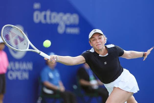 WUHAN, CHINA - OCTOBER 07: Donna Vekic of Croatia returns a shot in the Women s Singles Round of 64 match against Belinda Bencic of Switzerland on day 4 of 2025 Wuhan Open at Optics Valley International Tennis Center on October 7, 2025 in Wuhan, Hubei Province of China.  Copyright: xVCGx 111595688919