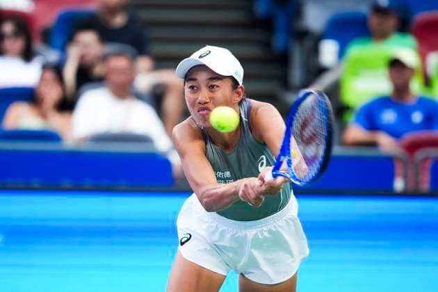 WUHAN, CHINA - OCTOBER 07: Zhang Shuai of China returns a shot in the Women s Singles Round of 64 match against Emma Navarro of the United States on day 4 of 2025 Wuhan Open at Optics Valley International Tennis Center on October 7, 2025 in Wuhan, Hubei Province of China.  Copyright: xVCGx 111595682169