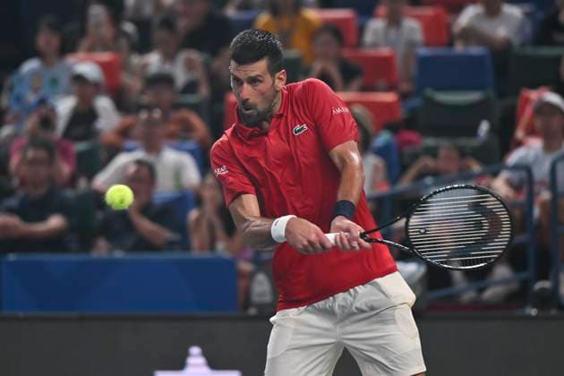 (251007) -- SHANGHAI, Oct. 7, 2025 -- Novak Djokovic competes during the men s singles round of 16 match between Novak Djokovic of Serbia and Jaume Munar of Spain at the ATP, Tennis Herren World Tour Shanghai Masters tennis tournament in Shanghai, east China, Oct. 7, 2025. ) (SP)CHINA-SHANGHAI-TENNIS-ATP TOUR-SHANGHAI MASTERS-MEN S SINGLES (CN) ChenxHaoming 