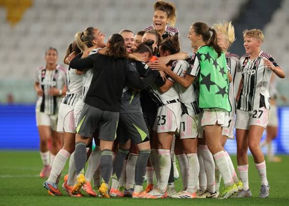 Turin, Italy, 7th October 2025. Cecilia Salvai of Juventus is mobbed by team mates following the final whistle, as her brace gave the hosts a 2-1 victory in the Juventus Women vs SL Benfica Women UEFA Womens Champions League match at Juventus Stadium, Turin. Picture credit should read: Jonathan Moscrop Sportimage EDITORIAL USE ONLY. No use with unauthorised audio, video, data, fixture lists, club league logos or live services. Online in-match use limited to 120 images, no video emulation. No use in betting, games or single club league player publications. SPI_053_JM_JUVE_BENFICA_UWCL SPI-4189-0053