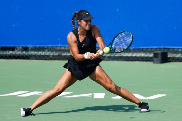 WUHAN, CHINA - OCTOBER 08: Jessica Bouzas Maneiro of Spain returns a shot in the Women s Singles Round of 32 match against Iva Jovic of the United States on day 5 of 2025 Wuhan Open at Optics Valley International Tennis Center on October 8, 2025 in Wuhan, Hubei Province of China.  Copyright: xVCGx 111595844901