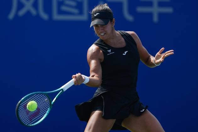 WUHAN, CHINA - OCTOBER 08: Jessica Bouzas Maneiro of Spain returns a shot in the Women s Singles Round of 32 match against Iva Jovic of the United States on day 5 of 2025 Wuhan Open at Optics Valley International Tennis Center on October 8, 2025 in Wuhan, Hubei Province of China.  Copyright: xVCGx 111595844893