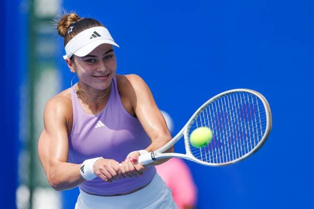 WUHAN, CHINA - OCTOBER 08: Iva Jovic of the United States returns a shot in the Women s Singles Round of 32 match against Jessica Bouzas Maneiro of Spain on day 5 of 2025 Wuhan Open at Optics Valley International Tennis Center on October 8, 2025 in Wuhan, Hubei Province of China.  Copyright: xVCGx 111595844886