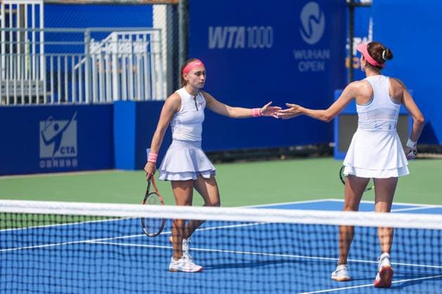 WUHAN, CHINA - OCTOBER 08: Anna Danilina of Kazakhstan and Aleksandra Krunic of Serbia react in the Women s Doubles Round of 16 match against Shuko Aoyama of Japan and Cristina Bucsa of Spain on day 5 of 2025 Wuhan Open at Optics Valley International Tennis Center on October 8, 2025 in Wuhan, Hubei Province of China.  Copyright: xVCGx 111595847812