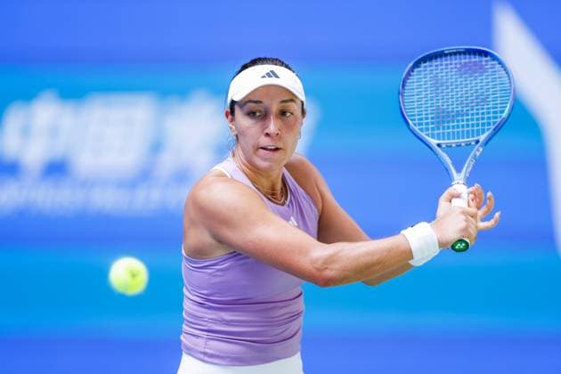 WUHAN, CHINA - OCTOBER 08: Jessica Pegula of United States returns a shot in the Women s Singles Round of 32 match against Hailey Baptiste of United States on day 5 of 2025 Wuhan Open at Optics Valley International Tennis Center on October 8, 2025 in Wuhan, Hubei Province of China.  Copyright: xVCGx 111595855363