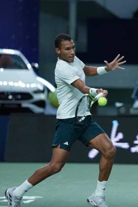 (251008) -- SHANGHAI, Oct. 8, 2025 -- Felix Auger-Aliassime of Canada hits a return during the men s singles round of 16 match agaisnt Lorenzo Musetti of Italy at the ATP, Tennis Herren World Tour Shanghai Masters tennis tournament in Shanghai, east China, Oct. 8, 2025. (SP)CHINA-SHANGHAI-TENNIS-ATP TOUR-SHANGHAI MASTERS-MEN S SINGLES (CN) DingxTing 
