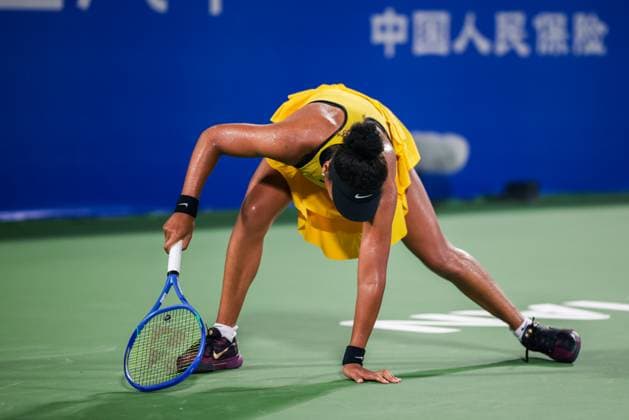 WUHAN, CHINA - OCTOBER 08: Naomi Osaka of Japan reacts in the Women s Singles Round of 32 match against Linda Noskova of Czech Republic on day 5 of 2025 Wuhan Open at Optics Valley International Tennis Center on October 8, 2025 in Wuhan, Hubei Province of China.  Copyright: xVCGx 111595911288