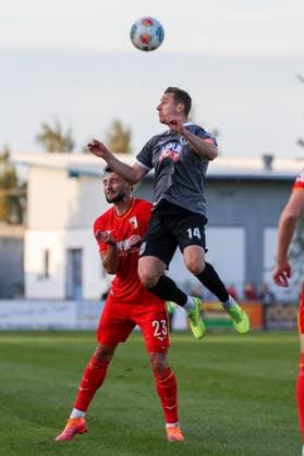in duel, action, with Maximilian Bauer 23 FC Augsburg , Dennis Dressel 14 SSV Ulm 1846 , FC Augsburg vs SSV Ulm 1846, Soccer, Test match, 08 10 2025 Burgau Bayern Germany Copyright: xkolbert-press ChristianxKolbertx