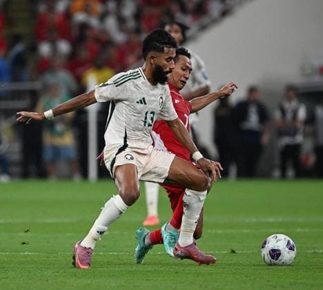 Fourth round of the AFC qualifiers for the 2026 FIFA World Cup, WM, Weltmeisterschaft, Fussball between Saudi Arabia and Indonesia Nawaf Bu Washl battles for the ball .Fourth round of the AFC qualifiers for the 2026 FIFA World Cup between Saudi Arabia and Indonesia. 7 October 2025 at Al-Inma Stadium in King Abdullah Sports City, Jeddah.
