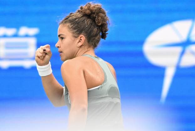 (251009) -- WUHAN, Oct. 9, 2025 -- Jasmine Paolini celebrates during the women s singles round of 16 match between Jasmine Paolini of Italy and Clara Tauson of Denmark at the 2025 Wuhan Open tennis tournament in Wuhan, central China s Hubei Province, Oct. 9, 2025. ) (SP)CHINA-WUHAN-TENNIS-WUHAN OPEN-WOMEN S SINGLES (CN) ChengxMin 
