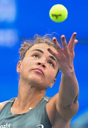 (251009) -- WUHAN, Oct. 9, 2025 -- Jasmine Paolini serves during the women s singles round of 16 match between Jasmine Paolini of Italy and Clara Tauson of Denmark at the 2025 Wuhan Open tennis tournament in Wuhan, central China s Hubei Province, Oct. 9, 2025. ) (SP)CHINA-WUHAN-TENNIS-WUHAN OPEN-WOMEN S SINGLES (CN) ChengxMin 
