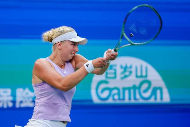 WUHAN, CHINA - OCTOBER 09: Clara Tauson of Denmark returns a shot in the Women s Singles Round of 16 match against Jasmine Paolini of Italy on day 6 of 2025 Wuhan Open at Optics Valley International Tennis Center on October 9, 2025 in Wuhan, Hubei Province of China.  Copyright: xVCGx 111596125286