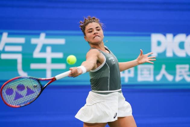 WUHAN, CHINA - OCTOBER 09: Jasmine Paolini of Italy returns a shot in the Women s Singles Round of 16 match against Clara Tauson of Denmark on day 6 of 2025 Wuhan Open at Optics Valley International Tennis Center on October 9, 2025 in Wuhan, Hubei Province of China.  Copyright: xVCGx 111596125294