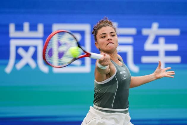 WUHAN, CHINA - OCTOBER 09: Jasmine Paolini of Italy returns a shot in the Women s Singles Round of 16 match against Clara Tauson of Denmark on day 6 of 2025 Wuhan Open at Optics Valley International Tennis Center on October 9, 2025 in Wuhan, Hubei Province of China.  Copyright: xVCGx 111596125295