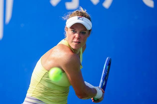 WUHAN, CHINA - OCTOBER 09: Laura Siegemund of Germany returns a shot in the Women s Singles Round of 16 match against Magdalena Frech of Poland on day 6 of 2025 Wuhan Open at Optics Valley International Tennis Center on October 9, 2025 in Wuhan, Hubei Province of China.  Copyright: xVCGx 111596144616