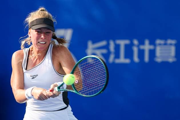 WUHAN, CHINA - OCTOBER 09: Magdalena Frech of Poland returns a shot in the Women s Singles Round of 16 match against Laura Siegemund of Germany on day 6 of 2025 Wuhan Open at Optics Valley International Tennis Center on October 9, 2025 in Wuhan, Hubei Province of China.  Copyright: xVCGx 111596144709