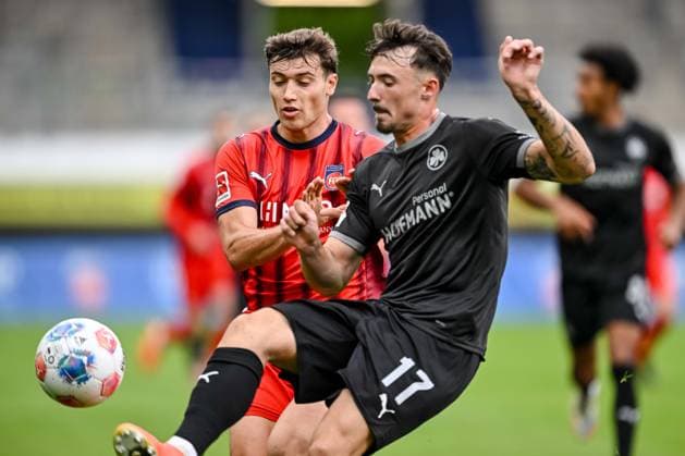 Heidenheim, Deutschland, 09.10.25: Luca Kerber (1. FC Heidenheim 1846) und Noah König (SpVgg Greuther Fürth) im Zweikampf waehrend des Freundschaftsspiel zwischen dem 1.FC Heidenheim vs SpVgg Greuther Fürth im Voith Arena am 09. Oktober 2025 in Heidenheim, Deutschland. (Foto von Harry Langer DeFodi Images) Voth Arena, Germany, 09.10.25: Luca Kerber (1. FC Heidenheim 1846) und Noah König (SpVgg Greuther Fürth) battle for the ball during the Friendly match between 1.FC Heidenheim vs SpVgg Greuther Fürth at Heidenheim on October 9, 2025 in Voth Arena, Germany. (Photo by Harry Langer DeFodi Images) DFB DFL REGULATIONS PROHIBIT ANY USE OF PHOTOGRAPHS AS IMAGE SEQUENCES AND OR QUASI-VIDEO. (Photo by Harry Langer DeFodi Images) DFB DFL REGULATIONS PROHIBIT ANY USE OF PHOTOGRAPHS AS IMAGE SEQUENCES AND OR QUASI-VIDEO. Heidenheim, Germany, 09 10 25 Luca Kerber 1 FC Heidenheim 1846 and Noah König SpVgg Greuther Fürth battle for the ball during the Friendly match between 1 FC Heidenheim vs SpVgg Greuther Fürth at Voith Arena on October 09, 2025 in Heidenheim, Germany Photo by Harry Langer DeFodi Images Voth Arena, Germany, 09 10 25 Luca Kerber 1 FC Heidenheim 1846 and Noah König SpVgg Greuther Fürth battle for the ball during the Friendly match between 1 FC Heidenheim vs SpVgg Greuther Fürth at Heidenheim on October 9, 2025 in Voth Arena, Germany Photo by Harry Langer DeFodi Images DFB DFL REGULATIONS PROHIBIT ANY USE OF PHOTOGRAPHS AS IMAGE SEQUENCES AND OR QUASI VIDEO Photo by Harry Langer DeFodi Images DFB DFL REGULATIONS PROHIBIT ANY USE OF PHOTOGRAPHS AS IMAGE SEQUENCES AND OR QUASI VIDEO