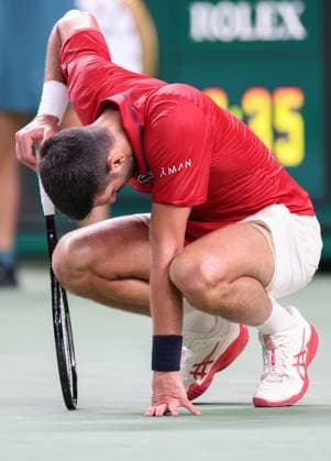 (251009) -- SHANGHAI, Oct. 9, 2025 -- Novak Djokovic reacts during the men s singles quarterfinal between Novak Djokovic of Serbia and Zizou Bergs of Belgium at the ATP, Tennis Herren World Tour Shanghai Masters tennis tournament in Shanghai, east China, Oct. 9, 2025. ) (SP)CHINA-SHANGHAI-TENNIS-ATP TOUR-SHANGHAI MASTERS-MEN S SINGLES (CN) DingxTing 