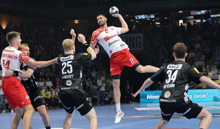 Matthes Langhoff, Branko Vujovic on the ball, Hakun West av Teigum duel Match scene Action Sport Handball CL Champions League Champions League Men 4 Matchday Season 2025 2026 09 10 2025 Füchse Berlin vs Dinamo Bucharest in the Max Schmeling Halle