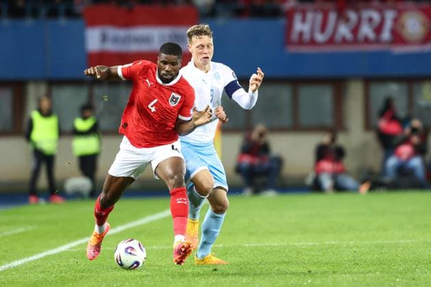 SOCCER - FIFA WC quali, AUT vs SMR VIENNA,AUSTRIA,09.OCT.25 - SOCCER - FIFA World Cup, WM, Weltmeisterschaft, Fussball 2026, European Qualifiers, group stage, OEFB international match, Länderspiel, Nationalmannschaft Austria vs San Marino. Image shows Kevin Danso (AUT) and Nicola Nanni (SMR).  GEPAxpictures xArminxRauthner