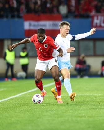 SOCCER - FIFA WC quali, AUT vs SMR VIENNA,AUSTRIA,09.OCT.25 - SOCCER - FIFA World Cup, WM, Weltmeisterschaft, Fussball 2026, European Qualifiers, group stage, OEFB international match, Länderspiel, Nationalmannschaft Austria vs San Marino. Image shows Kevin Danso (AUT) and Nicola Nanni (SMR).  GEPAxpictures xArminxRauthner