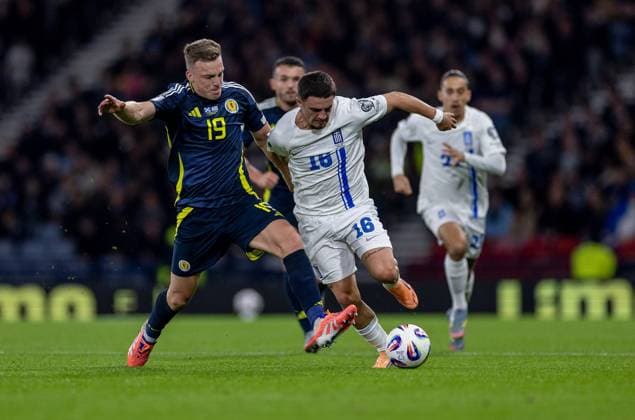 9th October 2025; Hampden Park, Glasgow, Scotland; World Cup Qualifiers International Football, Scotland versus Greece; Lewis Ferguson of Scotland challenges Christos Zafeiris of Greece  VagelisxGeorgariou
