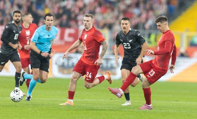9th October 2025; Stadion Slaski, Chorzow, Poland; International Football, friendly match, Poland versus New Zealand; Kacper Kozlowski (POL), Ryan Thomas (NZA), Krzysztof Piatek (POL)  FotoxOlimpik