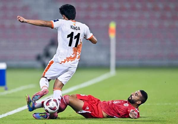 LEBANON v BHUTAN-AFC ASIAN CUP 2027 QUALIFIER THIRD ROUND Hussein Zein (bottom) of Lebanon and Kinga Wangchuk of Bhutan in action during the AFC Asian Cup 2027 Qualifier third round Group B match between Lebanon and Bhutan at Grand Hamad Stadium in Doha, Qatar, on October 9, 2025. DOHA Qatar Copyright: xNOUSHADx