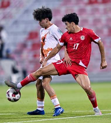 LEBANON v BHUTAN-AFC ASIAN CUP 2027 QUALIFIER THIRD ROUND Husseyn Chakroun (R) of Lebanon and Pema Zangpo of Bhutan in action during the AFC Asian Cup 2027 Qualifier third round Group B match between Lebanon and Bhutan at Grand Hamad Stadium in Doha, Qatar, on October 9, 2025. DOHA Qatar Copyright: xNOUSHADx