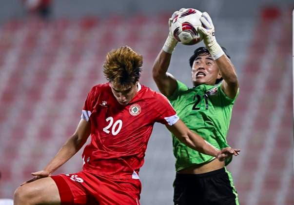 LEBANON v BHUTAN-AFC ASIAN CUP 2027 QUALIFIER THIRD ROUND Samy Merheg (L) of Lebanon and Jampel Dorji of Bhutan in action during the AFC Asian Cup 2027 Qualifier third round Group B match between Lebanon and Bhutan at Grand Hamad Stadium in Doha, Qatar, on October 9, 2025. DOHA Qatar Copyright: xNOUSHADx
