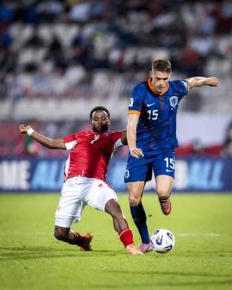 ATTARD - (l-r) Joseph Mbong of Malta and Micky van de Ven of the Netherlands at the National Stadium during the Dutch national team, Nationalteam s 2026 FIFA World Cup, WM, Weltmeisterschaft, Fussball qualifying match against Malta. ANP KOEN VAN WEEL xVIxANPxSportx xxANPxIVx 538797851 originalFilename: 538797851.jpg