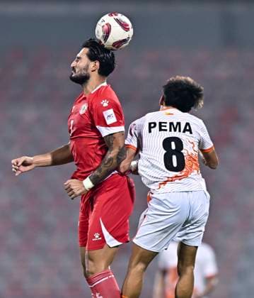 LEBANON v BHUTAN-AFC ASIAN CUP 2027 QUALIFIER THIRD ROUND Karim Darwich (L) of Lebanon and Pema Zangpo of Bhutan in action during the AFC Asian Cup 2027 Qualifier third round Group B match between Lebanon and Bhutan at Grand Hamad Stadium in Doha, Qatar, on October 9, 2025. DOHA Qatar Copyright: xNOUSHADx