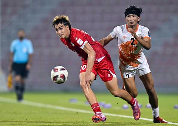 LEBANON v BHUTAN-AFC ASIAN CUP 2027 QUALIFIER THIRD ROUND Samy Merheg (L) of Lebanon and Yeshi Gyeltshen of Bhutan in action during the AFC Asian Cup 2027 Qualifier third round Group B match between Lebanon and Bhutan at Grand Hamad Stadium in Doha, Qatar, on October 9, 2025. DOHA Qatar Copyright: xNOUSHADx