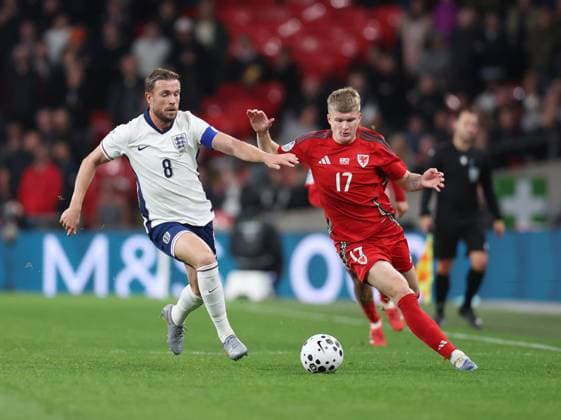 London, England, 9th October 2025. Jordan Henderson of England (l) challenges Jordan James of Wales (r) during the England vs Wales International Friendly, Länderspiel, Nationalmannschaft match at Wembley Stadium, London. Picture credit should read: Paul Terry Sportimage EDITORIAL USE ONLY. No use with unauthorised audio, video, data, fixture lists, club league logos or live services. Online in-match use limited to 120 images, no video emulation. No use in betting, games or single club league player publications. SPI_033_PT_Eng_Wal SPI-4207-0079