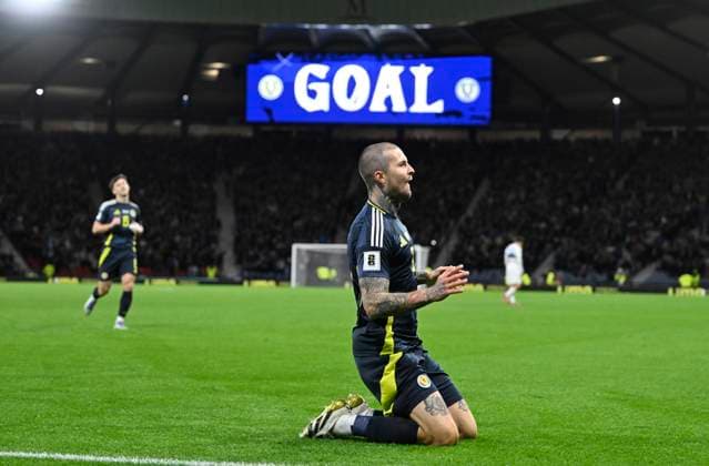 Glasgow, Scotland, 9th October 2025. Lydon Dykes of Scotland scores the sides 3rd goal after a defensive mix-up during the Scotland vs Greece FIFA World Cup, WM, Weltmeisterschaft, Fussball European Qualifying match at Hampden Park, Glasgow. Picture credit should read: Neil Hanna Sportimage EDITORIAL USE ONLY. No use with unauthorised audio, video, data, fixture lists, club league logos or live services. Online in-match use limited to 120 images, no video emulation. No use in betting, games or single club league player publications. SPI_067_NH_Scotland_Greece SPI-4206-0067