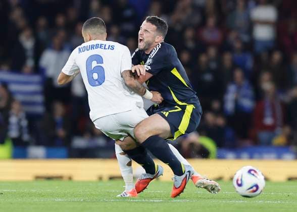 Scotland v Greece 2026 FIFA World Cup, WM, Weltmeisterschaft, Fussball Qualifiers John McGinn of Scotland is fouled by Dimitris Kourbelis of Greece during the 2026 FIFA World Cup Qualifiers Group C match at Hampden Park, Glasgow UK Newspapers OUT Copyright: xFredxPalmerx FIL-22338-0153