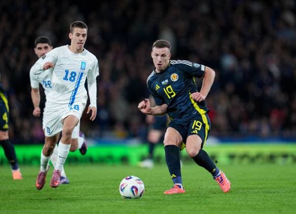 Lewis Ferguson of Scotland passes the ball while chased by Giannis Konstantelias of Greece Scotland v Greece, FIFA 2026 World Cup Qualifying, Group C, Football, Hampden Park, Glasgow, Scotland, UK - 09 Oct 2025Glasgow Hampden Park United Kingdom EDITORIAL USE ONLY No use with unauthorised audio, video, data, fixture lists, club league logos or live services. Online in-match use limited to 120 images, no video emulation. No use in betting, games or single club league player publications.  Copyright: xStuartxWallace Shutterstockx 15522896es