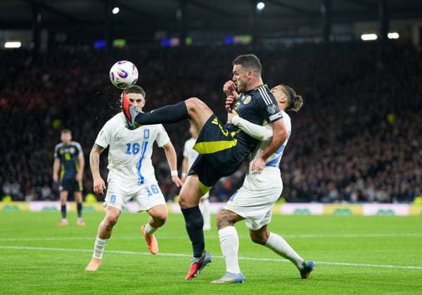 John McGinn of Scotland controls the ball under pressure from Kostas Tsimikas of Greece. Scotland v Greece, FIFA 2026 World Cup Qualifying, Group C, Football, Hampden Park, Glasgow, Scotland, UK - 09 Oct 2025Glasgow Hampden Park United Kingdom EDITORIAL USE ONLY No use with unauthorised audio, video, data, fixture lists, club league logos or live services. Online in-match use limited to 120 images, no video emulation. No use in betting, games or single club league player publications.  Copyright: xStuartxWallace Shutterstockx 15522896fb