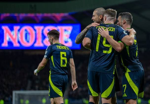 9th October 2025; Hampden Park, Glasgow, Scotland; World Cup Qualifiers International Football, Scotland versus Greece; Lyndon Dykes of Scotland celebrates with Lewis Ferguson of Scotland and John McGinn of Scotland after he shoots and scores to make it 3-1 in the 93rd minute  VagelisxGeorgariou