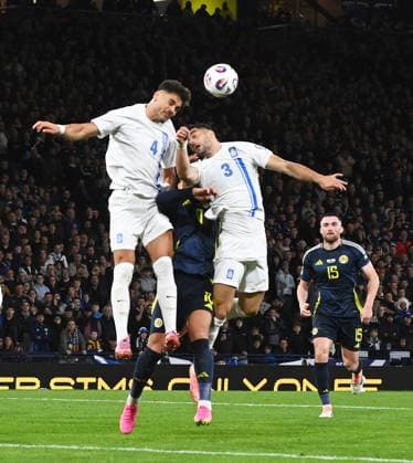 UK: Scotland v Greece, World Cup Qualifier, at Hampden Park in Glasgow, Scotland on 09 October 2025 Scotland v Greece, World Cup Qualifier, at Hampden Park in Glasgow, Scotland on 09 October 2025 Ntinos Mavorpanos (Greece) and Konstantinos Koulierakis (Greece) ensure Che Adams (Scotland) can™t get to the ball Glasgow Hampden Park Strathclyde Scotland Copyright: xGerxHarleyx