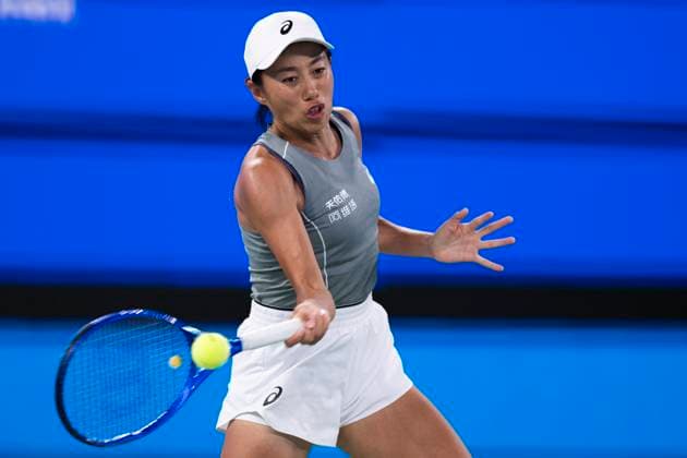 (251010) -- WUHAN, Oct. 10, 2025 -- Zhang Shuai of China hits a return during the women s singles round of 16 match against Coco Gauff of the United States at the 2025 Wuhan Open tennis tournament in Wuhan, central China s Hubei Province, Oct. 9, 2025. ) (SP)CHINA-WUHAN-TENNIS-WUHAN OPEN-WOMEN S SINGLES (CN) WuxZhizun 