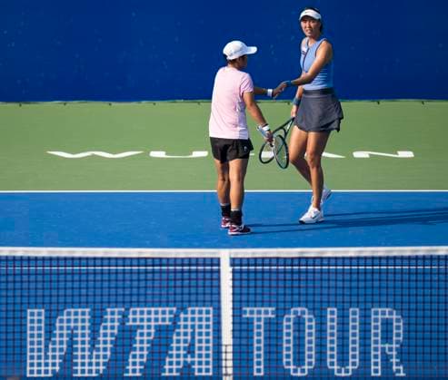 (251010) -- WUHAN, Oct. 10, 2025 -- Chan Hao-Ching (R) Jiang Xinyu celebrate during the women s doubles quarterfinal between Chan Hao-Ching (Chinese Taipei) Jiang Xinyu (China) and Storm Hunter (Australia) Katerina Siniakova (the Czech Republic) at the 2025 Wuhan Open tennis tournament in Wuhan, central China s Hubei Province, Oct. 10, 2025. ) (SP)CHINA-WUHAN-TENNIS-WUHAN OPEN-WOMEN S DOUBLES-QUARTERFINAL (CN) WuxZhizun 