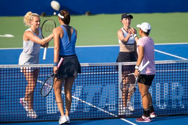 (251010) -- WUHAN, Oct. 10, 2025 -- Chan Hao-Ching (2nd L) Jiang Xinyu (1st R) and Storm Hunter (2nd R) Katerina Siniakova greet each other after the women s doubles quarterfinal between Chan Hao-Ching (Chinese Taipei) Jiang Xinyu (China) and Storm Hunter (Australia) Katerina Siniakova (the Czech Republic) at the 2025 Wuhan Open tennis tournament in Wuhan, central China s Hubei Province, Oct. 10, 2025. ) (SP)CHINA-WUHAN-TENNIS-WUHAN OPEN-WOMEN S DOUBLES-QUARTERFINAL (CN) WuxZhizun 