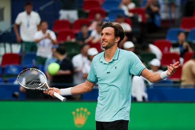 (251010) -- SHANGHAI, Oct. 10, 2025 -- Arthur Rinderknech of France reacts after defeating Felix Auger-Aliassime of Canada in the men s singles quarterfinal at the ATP, Tennis Herren World Tour Shanghai Masters tennis tournament in Shanghai, east China, Oct. 10, 2025. ) (SP)CHINA-SHANGHAI-TENNIS-ATP TOUR-SHANGHAI MASTERS-MEN S SINGLES (CN) WangxXiang 