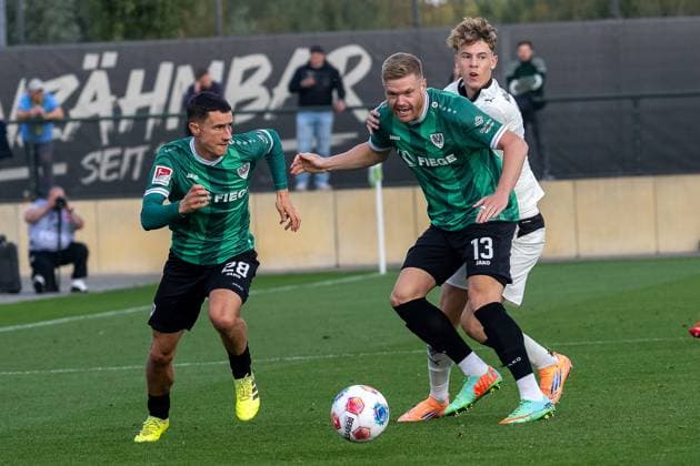 10 10 2025, Football friendly, Borussia Moenchengladbach SC Preussen Muenster, Season 2025 2026, Foal pitch at Borussia Park in Moenchengladbach duel between Marco Meyerhoefer SC Preussen Muenster, 28 , Lars Lokotsch SC Preussen Muenster, 13 and Niklas Swider Borussia Moenchengladbach, 39 Photo Kirchner Media Thomas Haesler Copyright: xKirchner-Media ThomasxHaeslerx