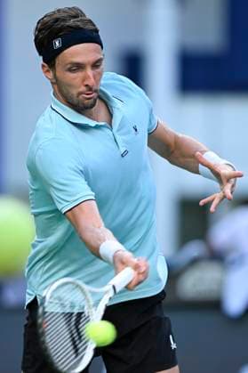 (251010) -- SHANGHAI, Oct. 10, 2025 -- Arthur Rinderknech of France hits a return to Felix Auger-Aliassime of Canada during the men s singles quarterfinal at the ATP, Tennis Herren World Tour Shanghai Masters tennis tournament in Shanghai, east China, Oct. 10, 2025. ) (SP)CHINA-SHANGHAI-TENNIS-ATP TOUR-SHANGHAI MASTERS-MEN S SINGLES (CN) ChenxHaoming 