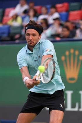 (251010) -- SHANGHAI, Oct. 10, 2025 -- Arthur Rinderknech of France hits a return to Felix Auger-Aliassime of Canada during the men s singles quarterfinal at the ATP, Tennis Herren World Tour Shanghai Masters tennis tournament in Shanghai, east China, Oct. 10, 2025. ) (SP)CHINA-SHANGHAI-TENNIS-ATP TOUR-SHANGHAI MASTERS-MEN S SINGLES (CN) WangxXiang 