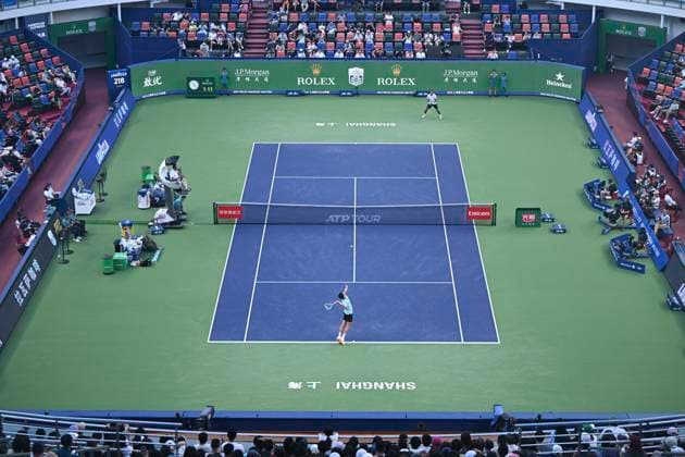 (251010) -- SHANGHAI, Oct. 10, 2025 -- Arthur Rinderknech (below) of France serves to Felix Auger-Aliassime of Canada during the men s singles quarterfinal at the ATP, Tennis Herren World Tour Shanghai Masters tennis tournament in Shanghai, east China, Oct. 10, 2025. ) (SP)CHINA-SHANGHAI-TENNIS-ATP TOUR-SHANGHAI MASTERS-MEN S SINGLES (CN) ChenxHaoming 